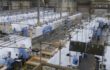 Ford helps develop air purifying respirators and builds ventilator parts manufacturing facility